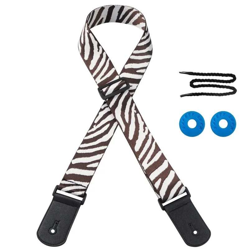 Sammlung von Gitarrengurten mit wildem Safari-Zebra-Muster - Farbe Weiß