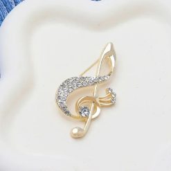 Broche Clf de Sol, verziert mit Strasssteinen