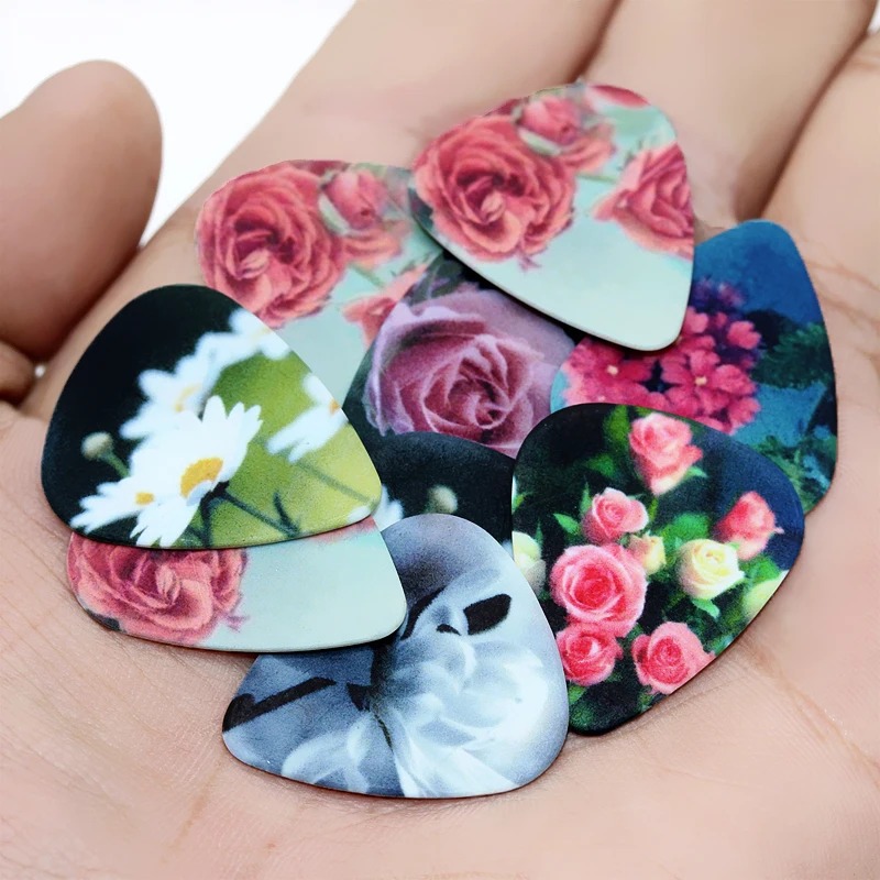 Set von 10 Plektren mit Flauris-Motiven - 3 Größen