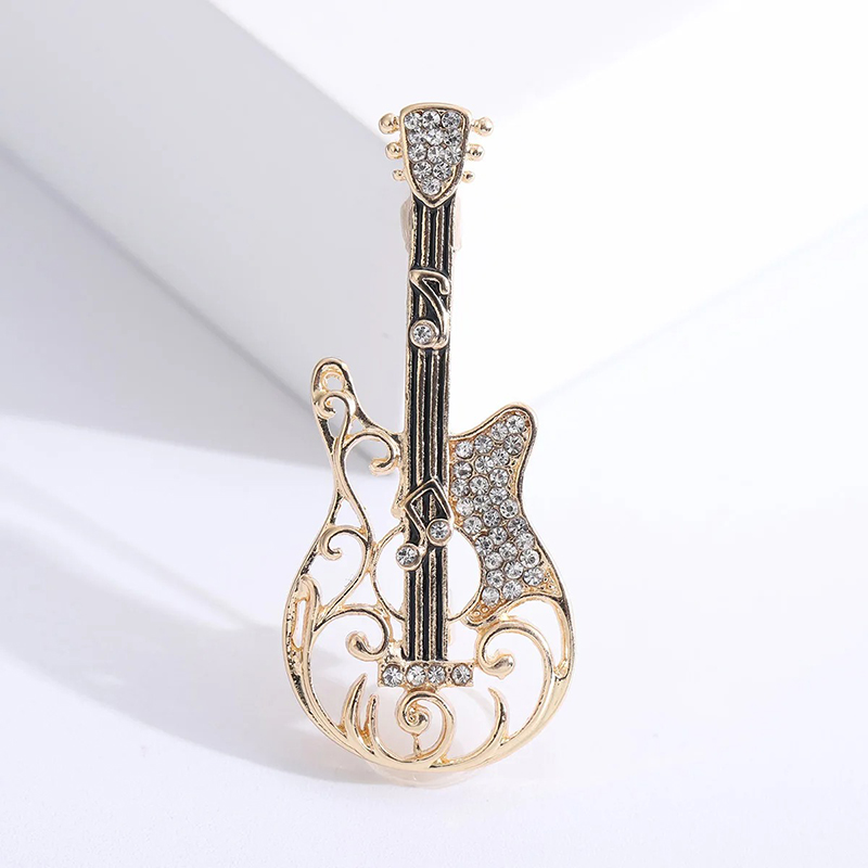 Elektrische Gitarrenbrosche im Hohl-Design mit Musiknoten-Motiv und Strass in Goldfarbe