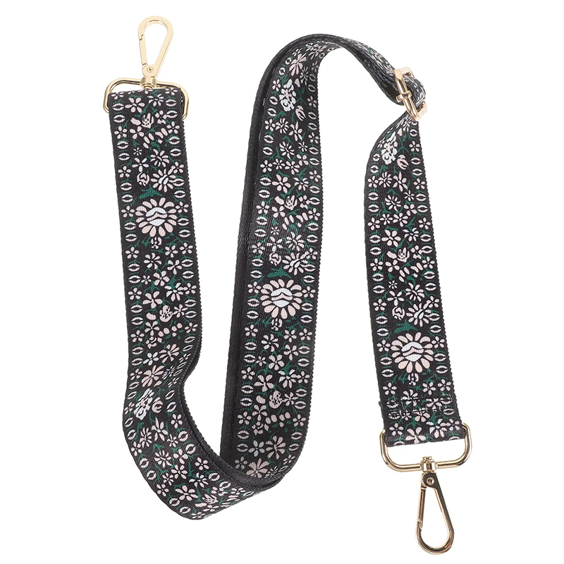 Details der bestickten floralen schwarzen Banjo-Schultergurt