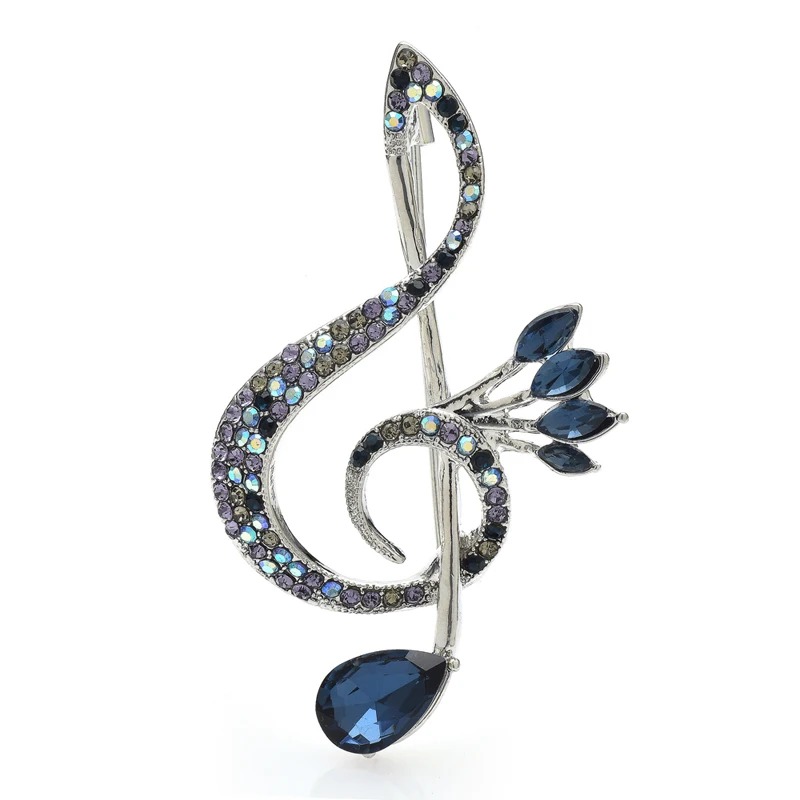 Wunderschöne Brosche in Form eines Violinschlüssels mit blauen Strasssteinen