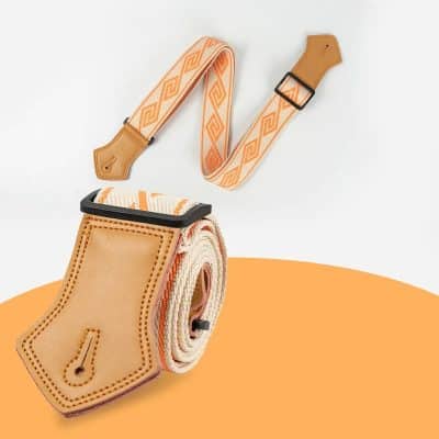 Details des Vintage Labyrinth Mandarinenorangen Gitarrengurts